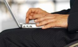 Wheelchair user working at a desk