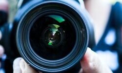 Close up of a camera being pointed at the camera