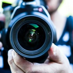 Close up of a camera being pointed at the camera